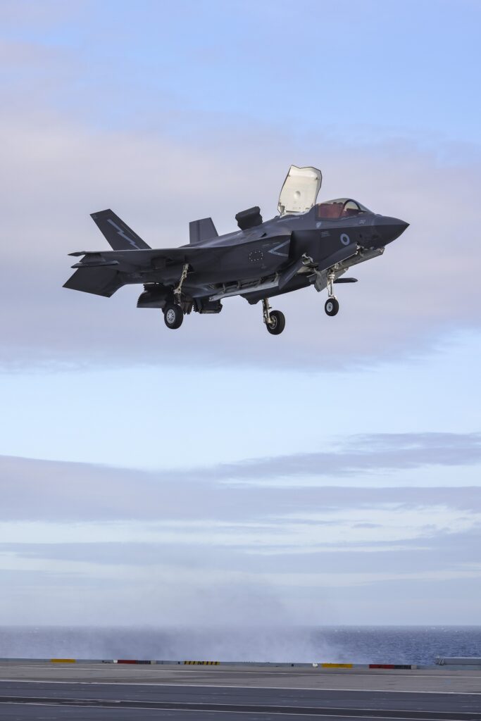 HMS QUEEN ELIZABETH EMBARKS F35-B LIGHTNING JETS<br /> Pictured: A pair of F35-B jets land on the flight deck of HMS Queen Elizabeth.<br /> On 11th November 2022, A day after sailing from Portsmouth, HMS Queen Elizabeth embarked the first F-35-B Lightning jets of 617 Squadron, based at RAF Marham. Over the coming days carrier qualifications will be conducted as the Carrier Strike Group (CSG) begins it's autumn deployment.<br /> Operation ACHILLEAN is a proof-of-concept deployment of NATO’s 5th generation maritime strike capability, comprising of F-35 carrier strike, Merlin and Wildcat helicopters. All elements of OP ACHILLEAN will be complementary of NATO and JEF activity, as the UK underscores its commitment to safeguarding European security.<br /> HMS Queen Elizabeth will be at the centre of the Carrier Strike Group, with the Commander UK Carrier Strike Group, Commodore Angus Essenhigh OBE Royal Navy and his staff commanding from the aircraft carrier.